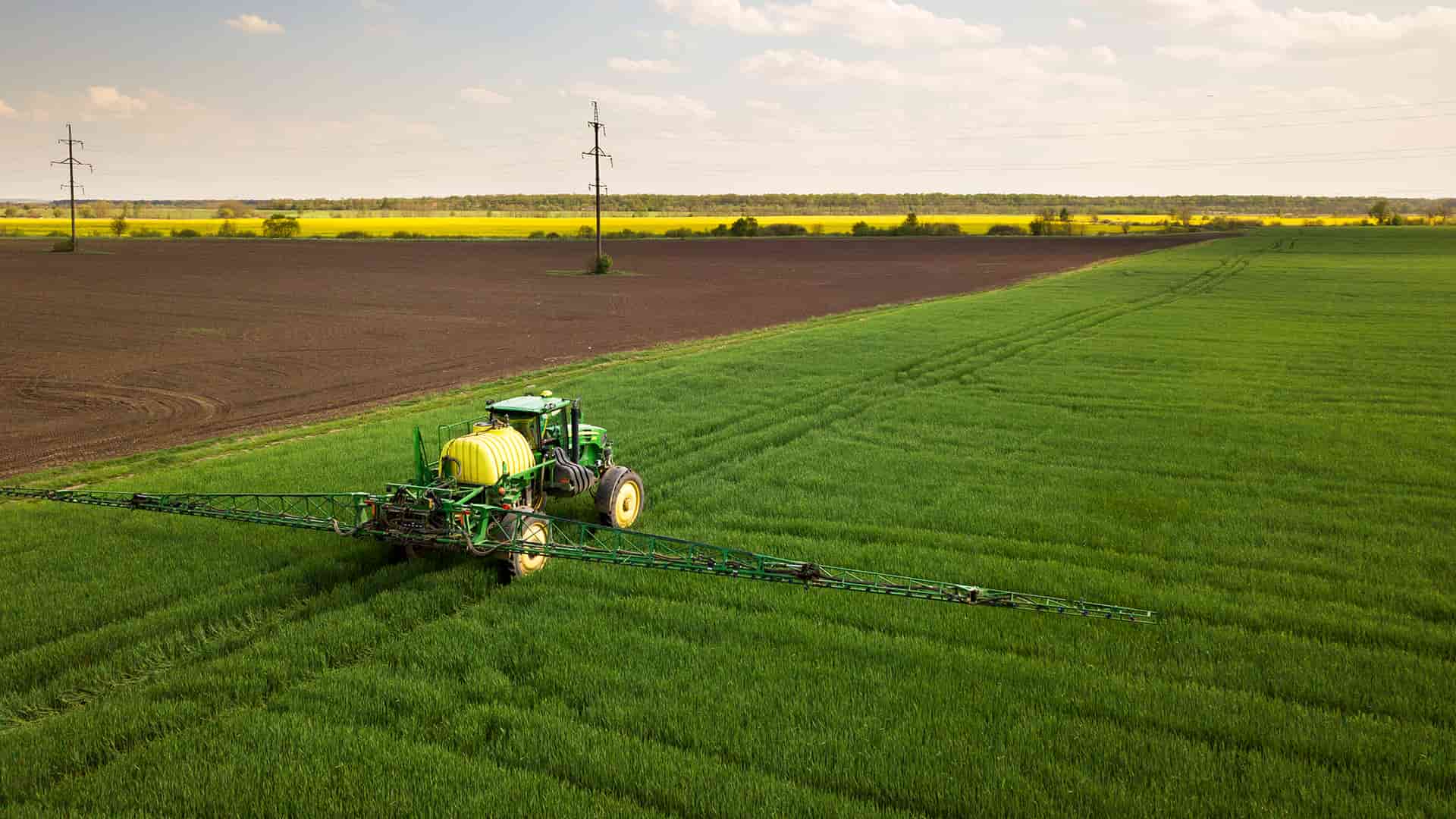 A tractor with the FJD AG1 Guidance System is working with the help of SBAS