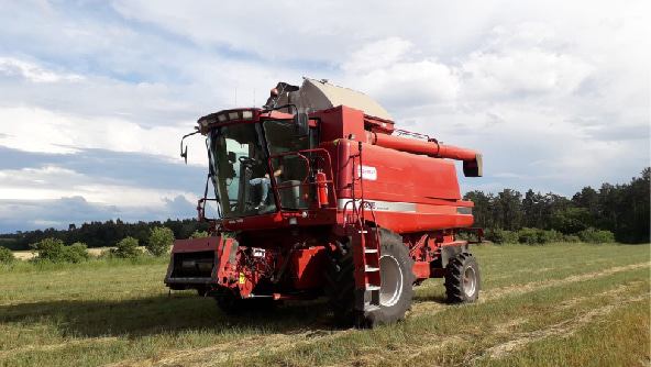 The harvester is working under the guidance of the FJD AH1 The harvester is working under the guidance of the FJD AH1