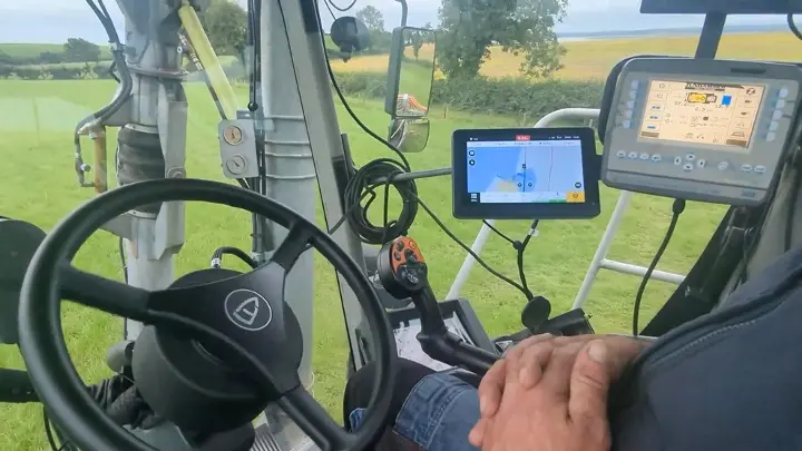 A Polish farmer automated wheat harvesting with FJD Precision Ag GPS technology.