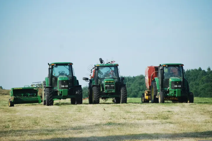 farm-tractors-working-in-the-field. farm-tractors-working-in-the-field.