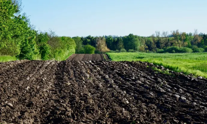 Compost pile creating nutrient-rich soil for sustainable agriculture. Compost pile creating nutrient-rich soil for sustainable agriculture.