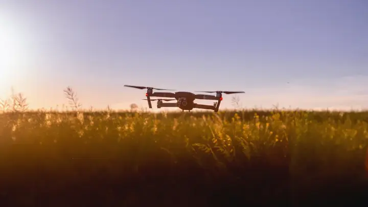 Drone flying over field at precision farming conference