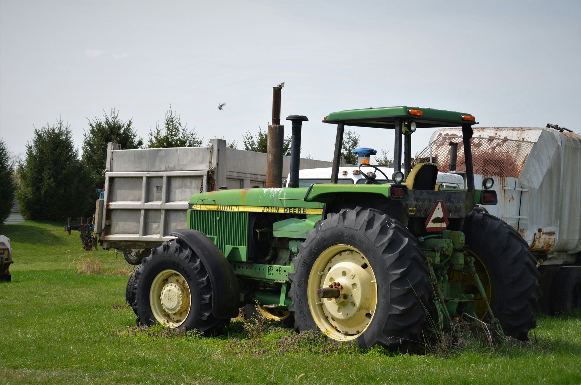 Tractor parked on grassy field
