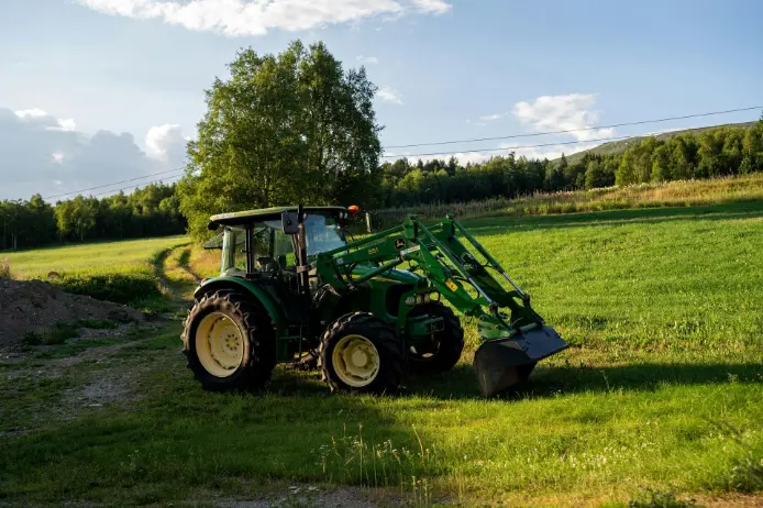 A tractor is working in the field