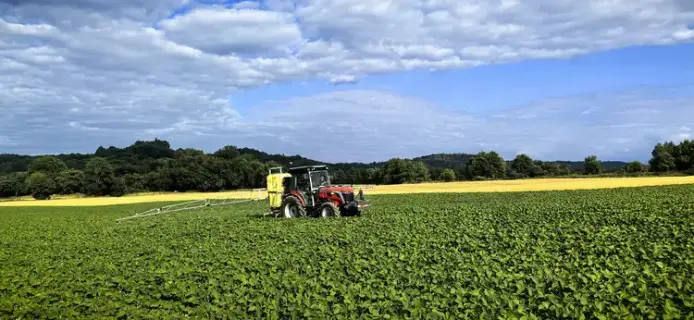 A smart farming tractor efficiently applies crop protection