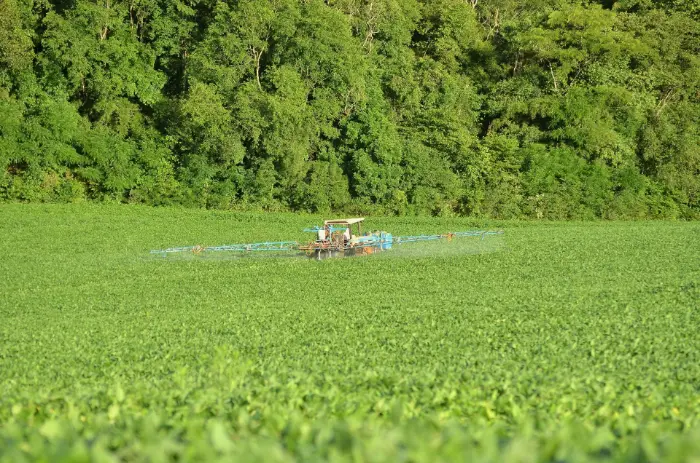 A sprayer covering a vast field with precision